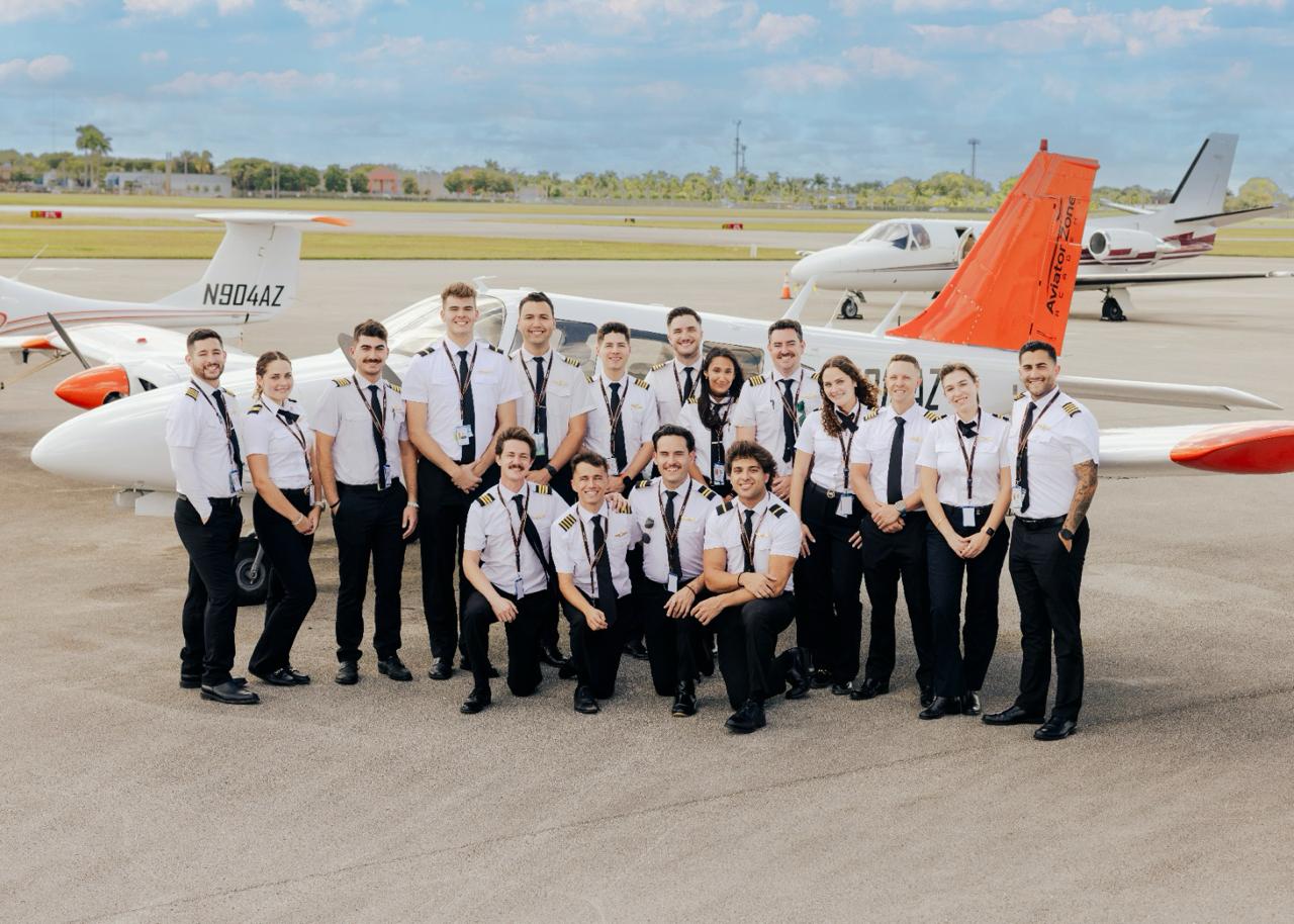 Aviator Zone Academy flight instructors and pilots standing in front of training aircraft